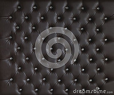 BROWN LUXURY PADDED STUDDED LEATHER BACKGROUND Stock Photo