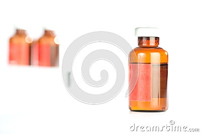 Brown medicine ampule on white Stock Photo