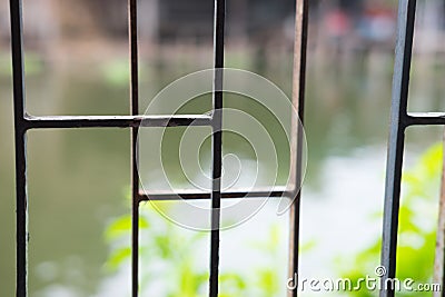 Brown metal grid window Stock Photo