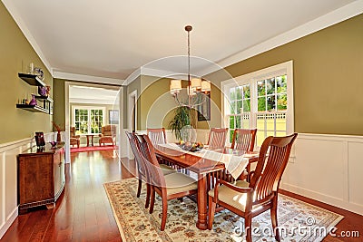 Brown and olive tones dining room interior Stock Photo