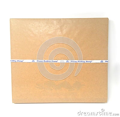 A brown packaged with a label saying Happy Birthday Jimmy in blue Stock Photo