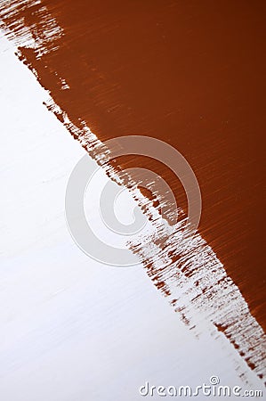 Brown paint roller Stock Photo
