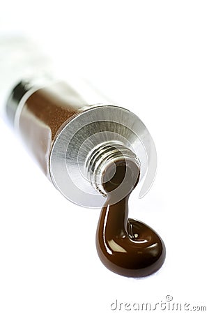 Brown paint squeezed from tube Stock Photo