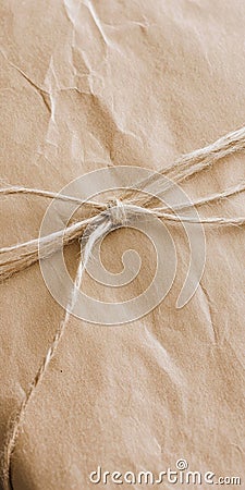 Brown paper package tied with simple string, AI Generative Stock Photo