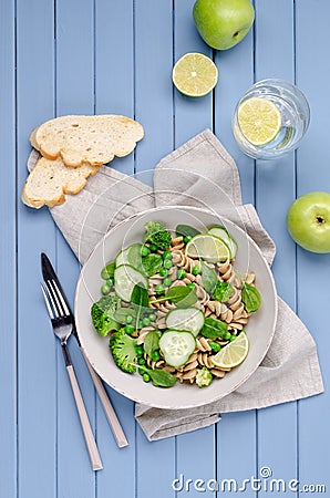 Brown pasta with vegetables Stock Photo