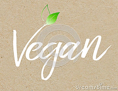 Brown recycled paper background with white coloured lettering vegan Stock Photo