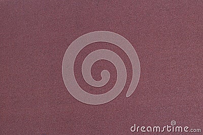 Brown-red sandpaper close-up. Grainy texture Stock Photo