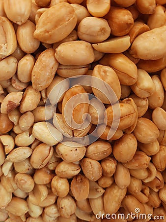 Brown salty crispy fried peanuts Stock Photo