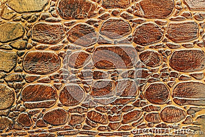 Brown scales macro exotic background, embossed under the skin of a reptile, crocodile. Texture genuine leather close-up Stock Photo