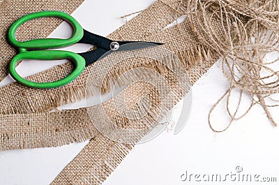 Brown scissors and grain sacking linen Stock Photo