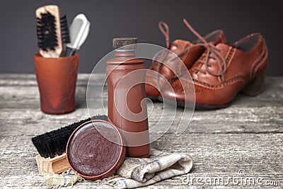 Brown shoeshine and brush for shoes protects Stock Photo