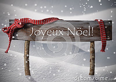 Brown Sign Joyeux Noel Means Merry Christmas,Snow, Snowfalke Stock Photo