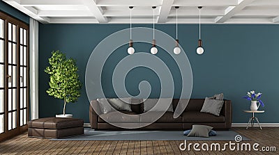 Brown sofa in a blue living room Stock Photo