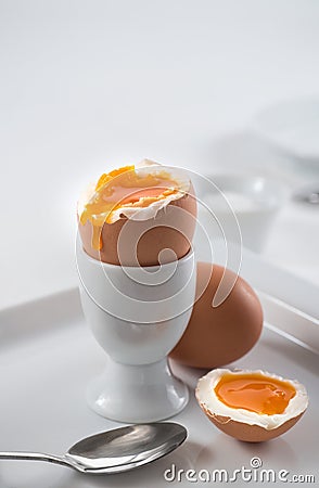 Brown soft-boiled open egg for breakfast Stock Photo