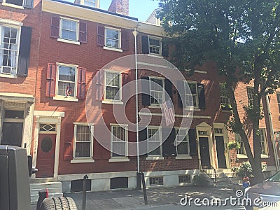 Brown stone town-homes in historic Washington Square West, Philadelphia, PA. Tree in Editorial Stock Photo