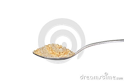 Brown sugar on metallic teaspoon Stock Photo