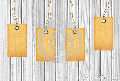 Brown tags on wooden Stock Photo