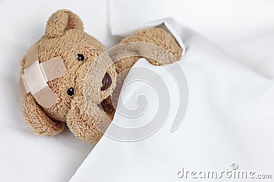 Poor Sick Teddy Stock Photo