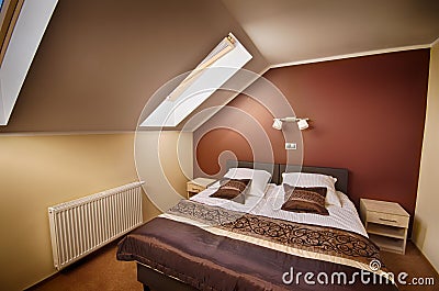 Brown theme loft bedroom Stock Photo