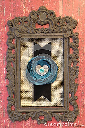 Brown Victorian framed heart on aqua rose, brown ribbon, and burlap Stock Photo