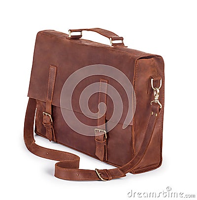 Brown Vintage leather briefcase with strap and brass buckle, cli Stock Photo