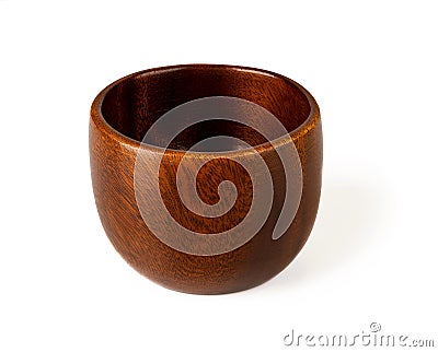 Brown wooden bowl isolated on white background. Beautiful eco-friendly tableware made of natural wood. Empty dishes for food Stock Photo