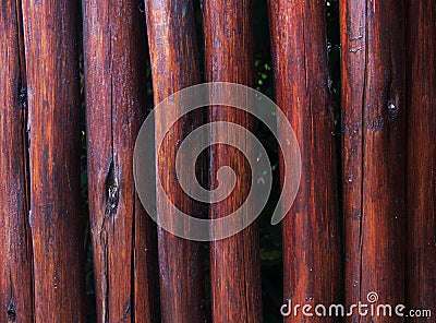 Brown wooden fence round planks background Stock Photo