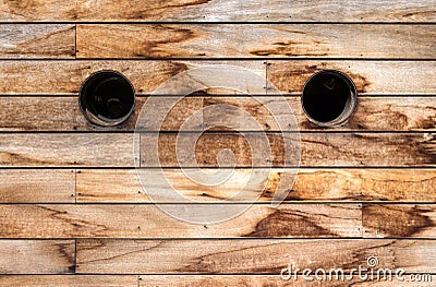 Brown wooden wall texture with portholes Stock Photo
