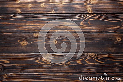 Brown and yellow brushed burnt wooden planks for background Stock Photo