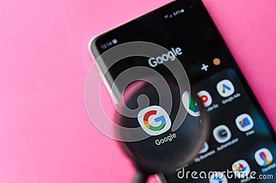 Browsing Google app on smartphone Editorial Stock Photo