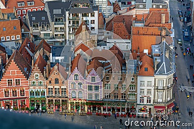 View to Bruges medieval Market Square Markt with colorful decorated guild houses Editorial Stock Photo