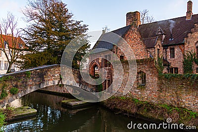 Bruges, Belgium iconic medieval houses, towers and Bonifacius Bridge. Classic postcard view of the historic city center. Often ref Stock Photo