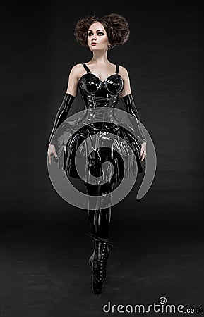 Brunette in fetish latex dress Stock Photo