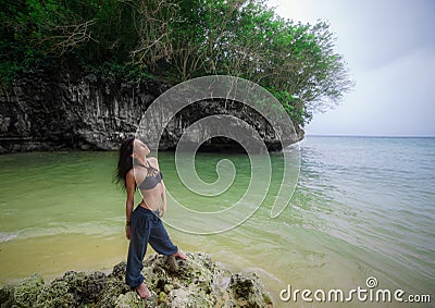 Brunette girl on the Bali beach Stock Photo