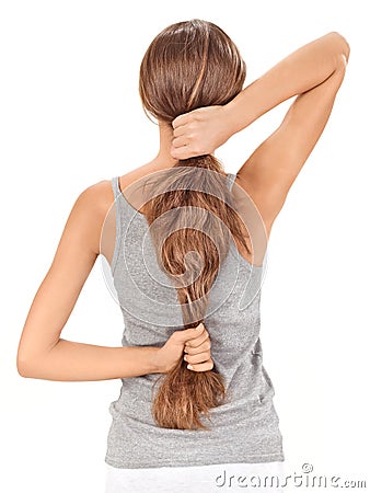 Brunette lady holding long hairs from back Stock Photo