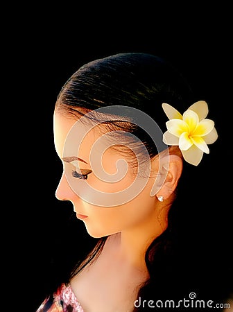 Brunette with long hair on black background Stock Photo