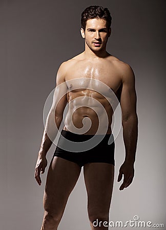 Brunette man with fit body Stock Photo