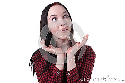 Brunette surprised woman in plaid shirt Stock Photo