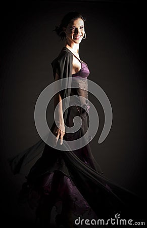 Brunette woman dancing Stock Photo