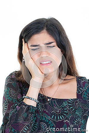 Brunette woman in pain having headache hand on head on white background Stock Photo