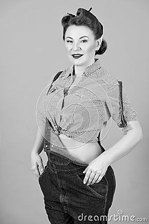 Brunette woman in pin-up styled dressed in denim Stock Photo