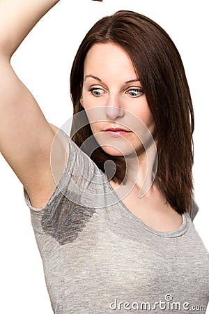 Woman sweating very badly under armpit Stock Photo