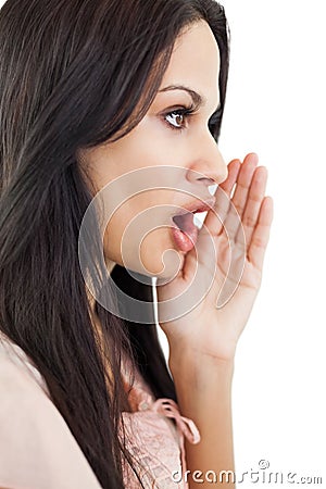 Brunette woman telling a secret Stock Photo