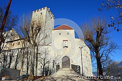 Brunico castle in winter time, sunny day, Bruneck in Puster Valley, South Tyrol, Italy Editorial Stock Photo