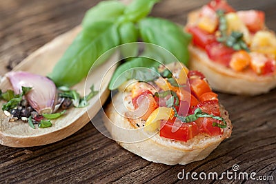 Bruschetta with tomato, paprika, garlic, basil Stock Photo