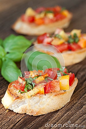 Bruschetta topped with tomato, paprika, garlic Stock Photo