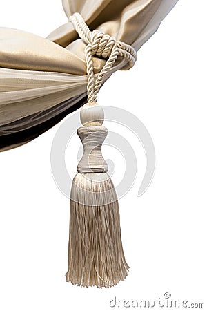 Brush for catching curtains - kutasy from natural beige silk on a white background Stock Photo