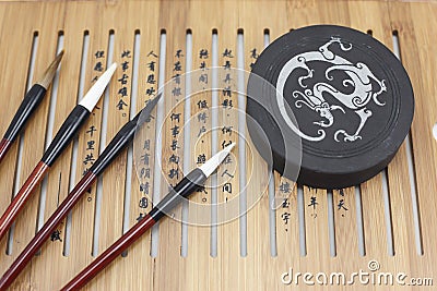 Brush and Chinese characters Stock Photo