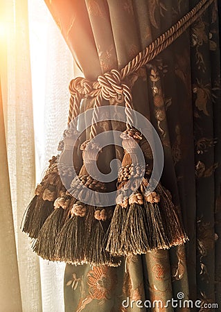 Brush curtains or curtain interior in palace style, classic curtains in the palace, handmade Stock Photo