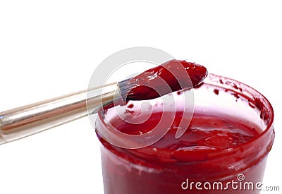 Brush with red paint Stock Photo